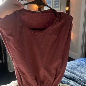 Mauvy color shoulder pad shit with sinched waist